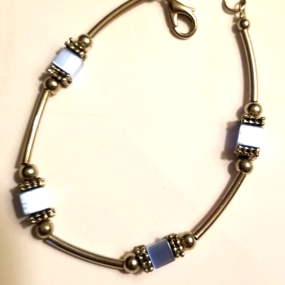 Stainless steel bracelet with blue square beads